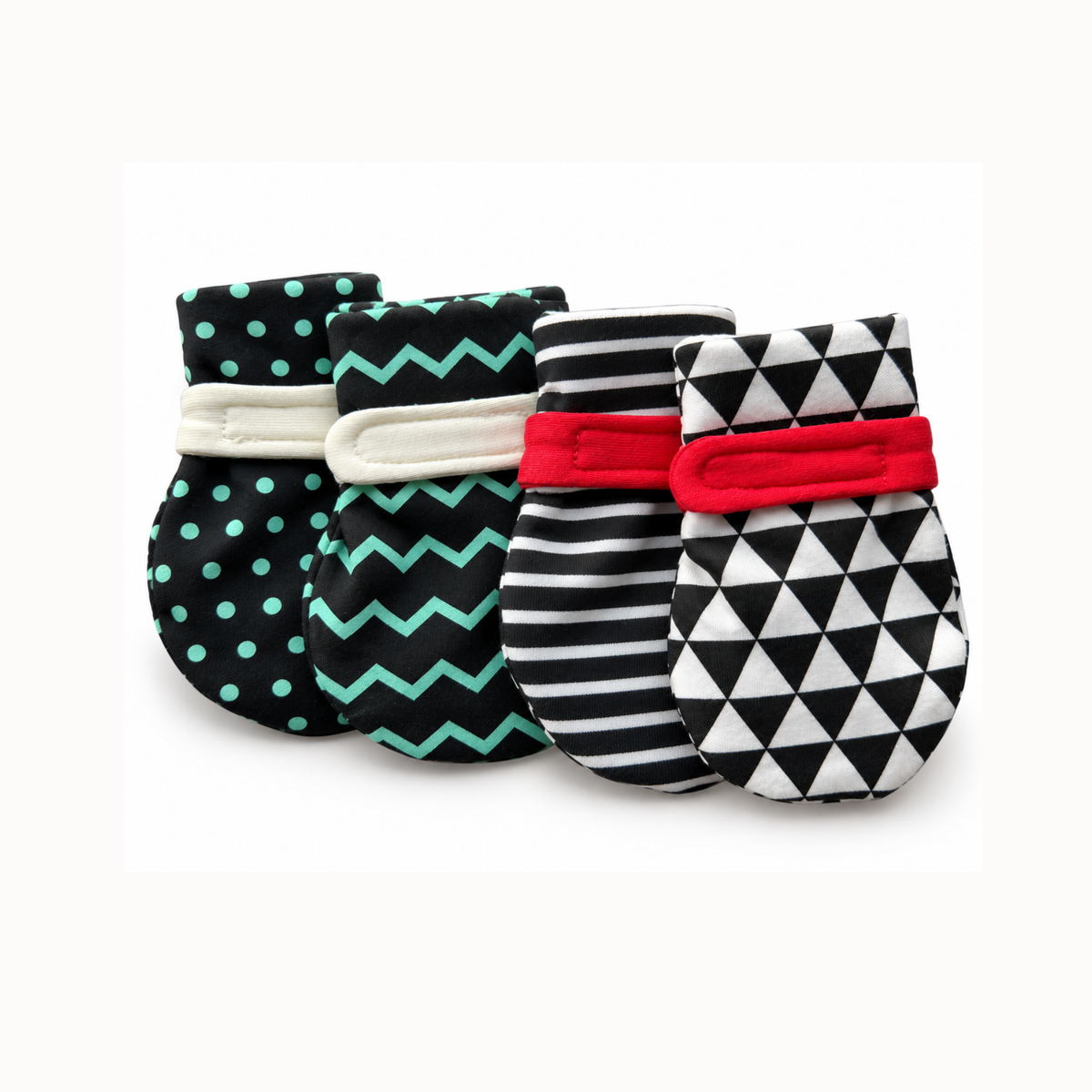 Looky mitts newborn mittens with high-contrast black-and-white patterns to encourage hand discovery. dual closure a stretch cuff and adjustable strap helps keep the baby mittens from slipping off. 